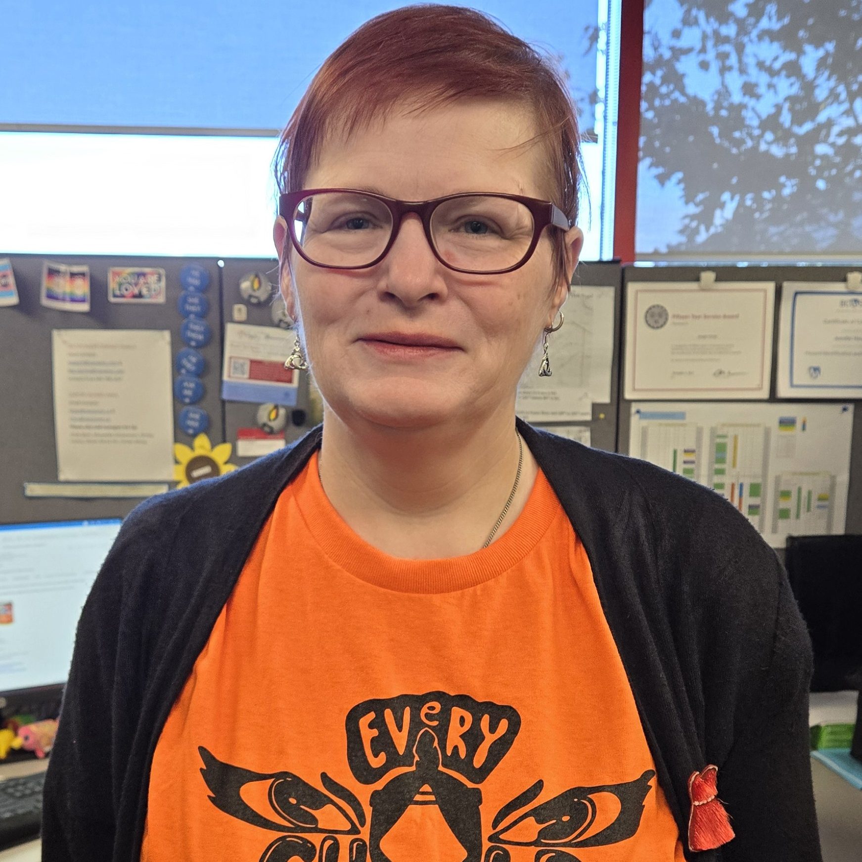 Jen Horsley wearing orange shirt that reads "Every Child Matters"